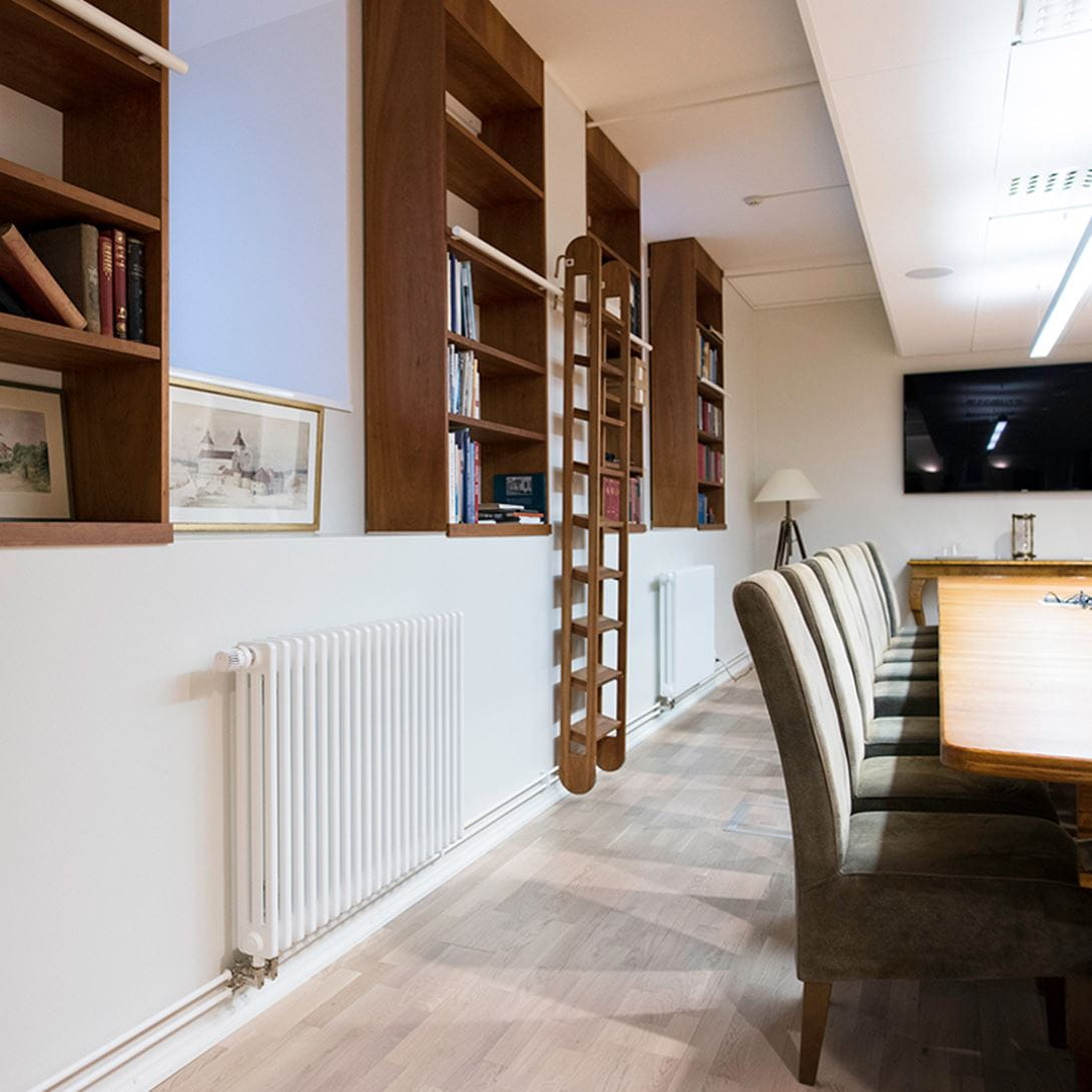 Purmo Delta columnradiators in an office space