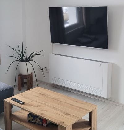 iVector S2 fan convector in living room holiday apartment